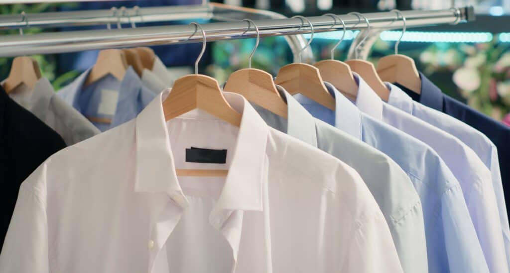 Pressed dress shirts on hangers